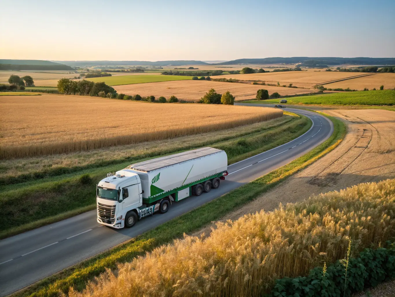 A detailed image of a Stancilsecuredlogistics semi-truck on a highway, highlighting its capacity for long-distance freight transport.